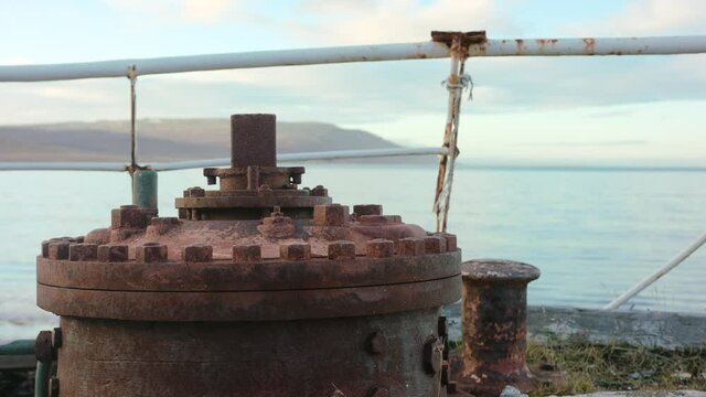 View of the hull of a shipwreck toward the ocean