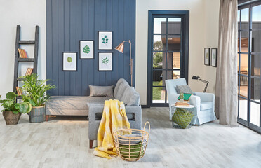 Modern blue room, grey sofa, yellow blanket and leaf frame, lamp, home decoration and parquet style.