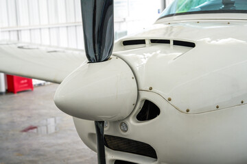 Naklejka na ściany i meble Close-up of part of the fuselage of a small aircraft