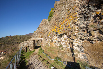 Fototapeta premium Ruins of Orsini Fortress,is situated on a steep hill of volcanic tuff.This fortification is excellent strategic position was built by Pope Innocent III in 1198 .Trevignano Romano,Italy