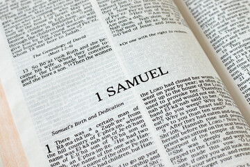 1 Samuel open Holy Bible Book close-up. Old Testament Scripture prophecy. Studying the Word of God Jesus Christ. Christian biblical concept of faith and trust.