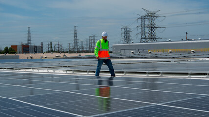 Technology solar cell, Engineer service check installation solar cell on the roof of factory. technician inspection and repair solar cell on the roof of factory.