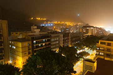 Calima night in Santa Cruz de Tenerife. Sand in the city air. Canary islands, Spain