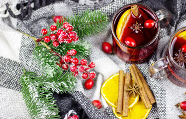 hot mulled wine on a wooden table. New year concept