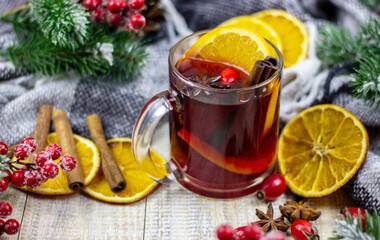 hot mulled wine on a wooden table. New year concept