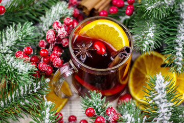 hot mulled wine on a wooden table. New year concept