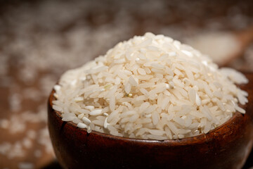 The rice is on the wooden table