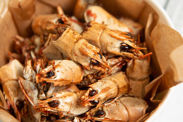 Fried shrimp heads in a bowl 