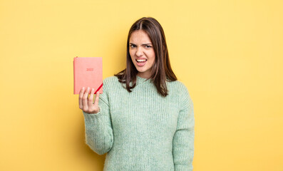 pretty woman feeling puzzled and confused. planner concept