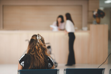 woman waiting for treatment Sitting area in the hospital.