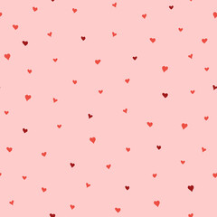 Seamless pattern with hand-drawn hearts on pink background in boho style.