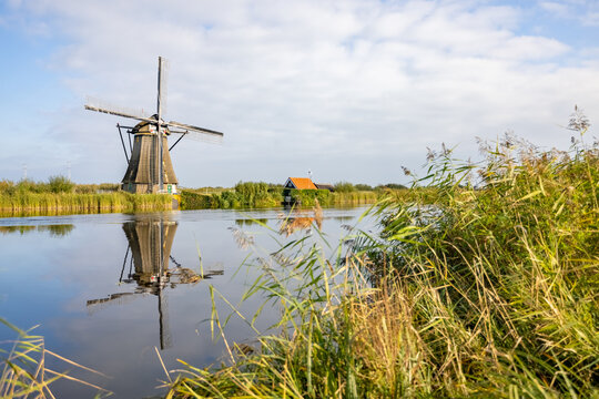 Horizontal picture of one of the famous Dutch windmills at Kinderdijk, a UNESCO world heritage site. On the photo is one mill of the 19 windmills at Kinderdijk, South Holland, the Netherlands, which
