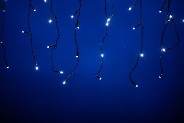 abstract Christmas lights background on blue