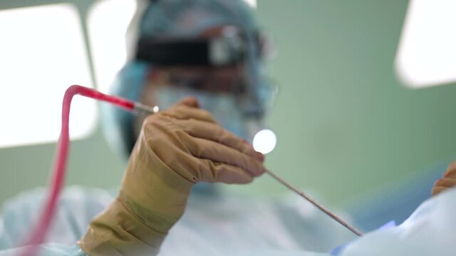 modern endoscopic operation in hospital, surgeon is saving life of car crash victim