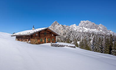 Alpine hut in an idyllic winter landscape, Salzburger Land, Austria