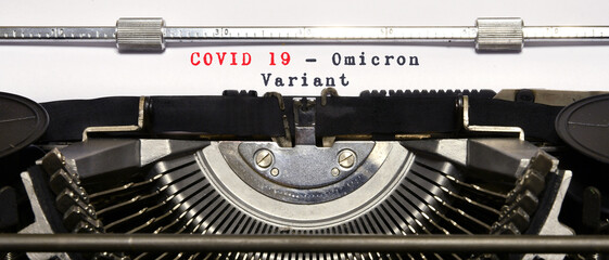Covid-19 new omicron virus variant symbol. Concept words 'Covid 19 Omicron Variant' typed on...