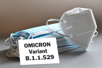 white KN95 or N95 mask with antiviral medical mask for protection against coronavirus. Surgical...