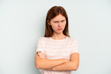 Young English woman isolated on blue background unhappy looking in camera with sarcastic expression.