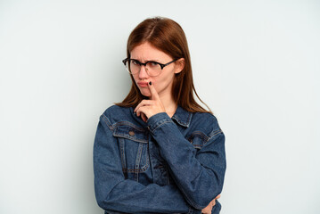 Young English woman isolated on blue background contemplating, planning a strategy, thinking about the way of a business.