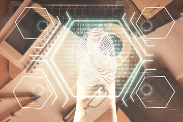 Double exposure of finger print over table with phone. Top view. Concept of mobile security.