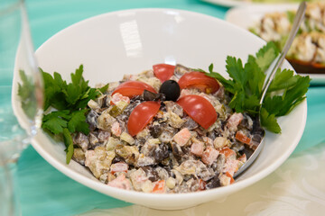 Cold snacks on the festive table. A table with food served with dishes for guests.