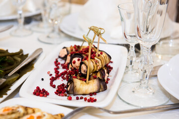 Cold snacks on the festive table. A table with food served with dishes for guests.