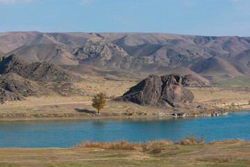 Ili river rocky banks autumn landscape