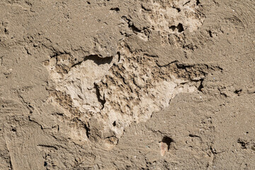 Cracked and abstract grunge texture. Aged material surface backdrop. Weathered effect pattern. Old and dirty background.