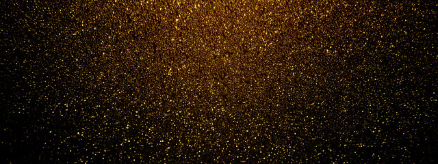 Fototapeta na wymiar Gold and black glitter texture background. Shiny festive banner