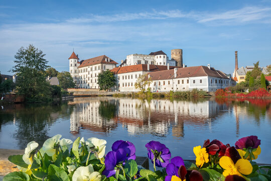 Jindrichuv Hradec, Czechia - view of historic castle with flowers on foreground