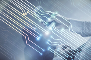 Double exposure of man's hand holding and using a digital device and data theme drawing. Technology concept.