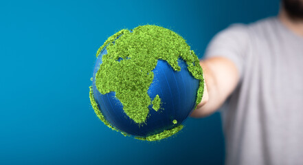 Ecology concept of green Earth globe made of leaves