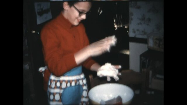 Making the Dough 1973 - A boy makes dough at his home in Vernon Township, New Jersey in 1973.