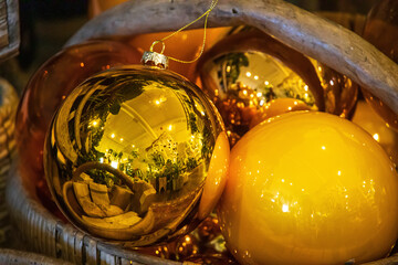 yellow glass balls in a bowl for Christmas