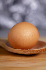 eggs with wooden spoon on the table