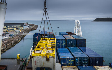Containers being loaded on the Bella Desgagne, a ship travelling on the St Lawrence river,...