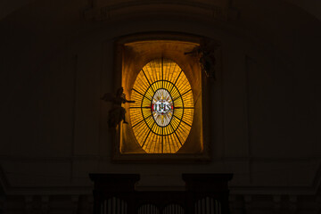 Toledo, Spain, October 2019 - view of a beautiful stained glass window at The Church of San Idelfonso,  also known as the Jesuit church
