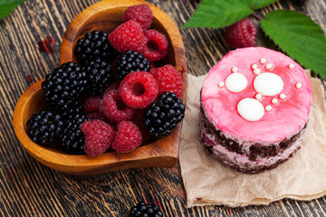 berry cake with chocolate cakes and butter cream with berry jam