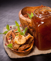 Homemade jam from figs, cocoa and spices - cinnamon, cardamom, tubby. Candy set. Sweet life.