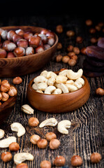 Fototapeta na wymiar dried cashew nuts on a wooden table