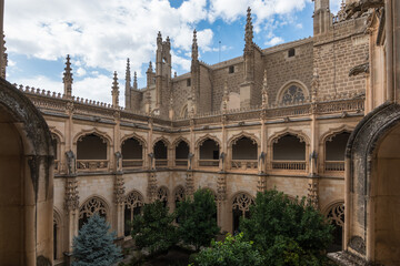 Fototapeta na wymiar Toledo, Spain, October 2019 - view of the cloister at Monastery of San Juan de los Reyes