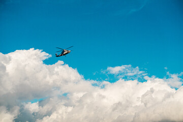 airplane helicopter in the sky with amazing clouds