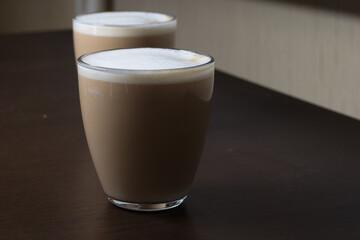 Two glasses of coffee with milk cappuccino or latte