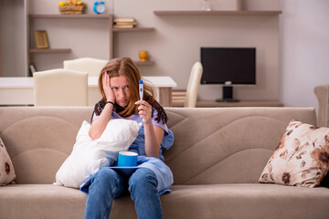 Young woman suffering at home