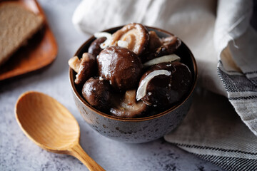 Gruzdi mushrooms with pickled onion and garlic.