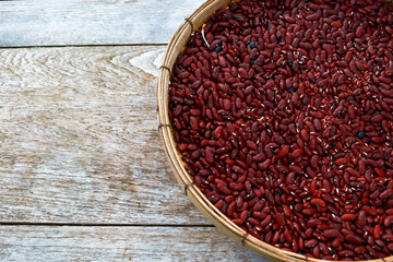 Red kidney beans in a wooden stick together. Local culture.
