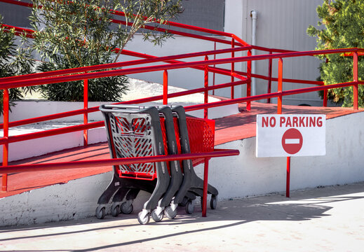 Parking Trolleys At The Store With  Road Sigh Np Parking