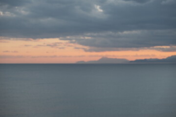 Obraz premium purple pink sunset over the sea