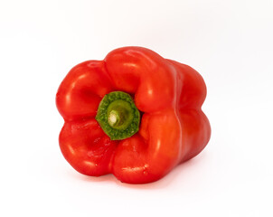 ripe with drops of water red pepper isolated on light background