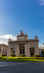 Obraz premium Historic buildings and tourist places in Valencia Spain. Trees and streets of Valencia Spain.